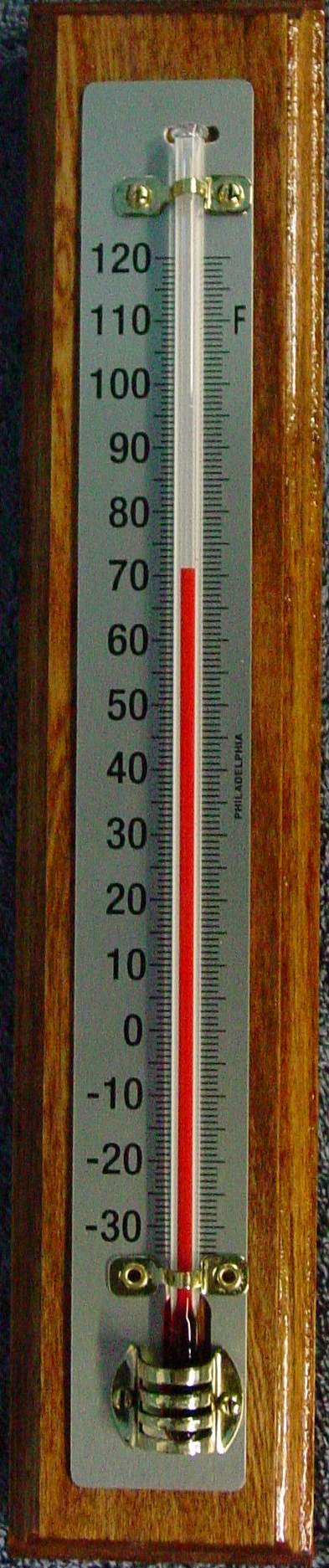 Close view of a Philadelphia Instruments wood-back thermometer with a Fahrenheit scale